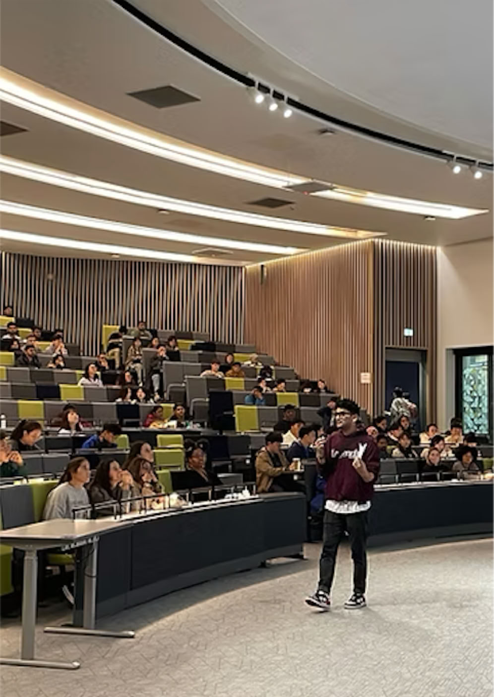 Kritesh presenting to students